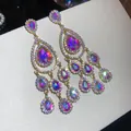 Elegant gold-tone dangle earrings with vibrant iridescent AB crystals for a vintage look - AB Color Pear-Shape Multi-layer Tassel Style (69#)
