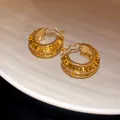 Orecchini a cerchio vintage a forma di C placcati in oro con zirconi gialli scintillanti. - Marrone oro