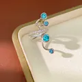 Close-up of silver ear cuff featuring blue zircons and shimmering clear stones. - Multi-layer Ear Clip / Single Piece / Silver/Blue