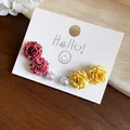 Close-up detail of colorful resin rose and pearl stud earrings on a display card - Dark Red Yellow Flower Pearl Set / 6-Piece Set / Rose Red-Yellow-White