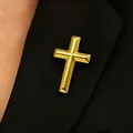 Close-up of a 3D gold alloy cross brooch pinned on a black suit lapel - Gold 3D Cross Brooch (11212) / Gold