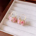 Sweet pink rose flower basket earrings decorated with crystals in a golden finish - Style 43