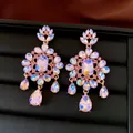 Elegant flower drop earrings in gold finish with iridescent AB crystals and pink stones - Style 78