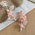 Detailed view of ethereal pink fabric flower hair clips with elegant pearl accents - Duckbill Clip (1 Pair) / Pink