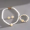 Elegant pearl jewelry set featuring white camellia flowers with golden accents - Three-Piece Set / White