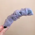 Close-up of elegant lavender pleated organza fabric banana hair clip for high ponytails - Single Piece / Purple