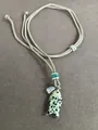 Retro woven cord necklace featuring a spotted stone fish pendant in beige and black. - Spotted Stone