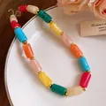 Detailed shot of a colorful marbled acrylic cylinder bead necklace in a sweet style - Necklace / Short Style / Colorful