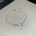 Elegant silver-toned bracelet with zircon flowers and a pink cat pendant for women - Cat Head Shape Main Stone Thin Chain Style / Silver-Pink