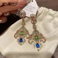 Vintage palace style earrings with colorful zircon stones in a golden floral setting - Hollow Pattern Teardrop / Silver Needle / 41# Silver Green