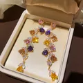 Close-up of heart-shaped multi-color cubic zirconia dangle earrings in a luxury box - Silver Needle Zircon Heart Tassel Stud Earrings (12#)