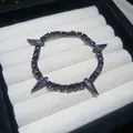 Close-up of hip-hop punk zircon bracelet inspired by Black Panther's claw design. - Gunmetal