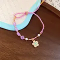 Elegant handmade woven pink cord bracelet with cherry blossom charm and pearls for women - Flower Style