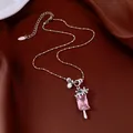 Vue détaillée d'un collier pendentif esquimau argenté avec des pierres roses brillantes. - Collier ras-du-cou / Argent Rose
