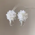 Detail view of white flower cluster earrings with clear water-drop shaped resin pendants - Silver Earring Post-White / White
