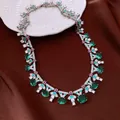 Vintage silver-tone necklace with oval green zircons and red accents on brown silk - Necklace / Silver-Green