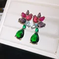 Close-up view of elegant teardrop earrings with vibrant multi-colored zircon gemstones. - Silver Earring Post Style / Silver - Rainbow