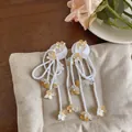 Sweet white and yellow floral beaded tassel earrings with elegant long fringes for women - Flower Tassel Style / White