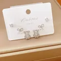 Detail of silver pin zircon earring set with bow and bear designs on card - Bear Bow Stud Earrings Set / 3 Pairs Set / Silver
