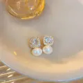 Elegant gold stud earrings with a square zircon cluster and a white dangling pearl. - 925 Silver Needle / Gold