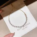 Detail view of sparkly marquise-cut cubic zirconia stones on a gold slider bracelet - Style 7 Bracelet