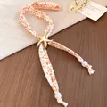 Detail of orange shell starfish pattern scarf necklace with golden starfish charm and beads - Gold Starfish Slider Pendant
