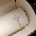 Detailed macro view of an elegant pink zircon flower bracelet with sparkling stones - 38# Bracelet