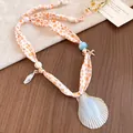 Detail of bohemian silk scarf necklace with natural scallop shell and starfish charms - Large Scallop Pendant