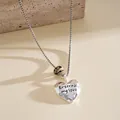 Gros plan du collier à pendentif cœur plissé en argent avec gravure Enternal my love. - Cœur (Pierre Dalmatien) / Argent