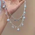 Elegant double-layered silver necklace with shell and starfish charms plus colorful rhinestones - Silver - Rainbow