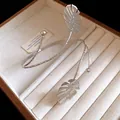 Detailed macro view of elegant silver monstera leaf arm cuff presented in jewelry box - Monstera Leaf Shape (2 Style)