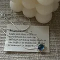 Detailed view of jelly blue cubic zirconia sugar cube pendant on a silver chain - Square Sugar Zirconia Pendant Style / Silver with Blue Main Stone