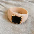 Exaggerated marbled acrylic bangle featuring a gold-framed black square centerpiece - Off-White/Dark Coffee