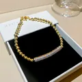 Elegant gold beaded bracelet featuring a sparkling zircon geometric bar in a luxury box - Gold Silver (Metal Bead Style)