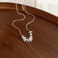Detailed macro shot of minimalist silver necklace with irregular pendants on dark wood - Irregular Smashed Silver Style(HN12543) / Silver