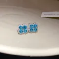 Elegant silver-tone flower stud earrings with brilliant blue and white cubic zirconia - Silver Flower Cluster Style (HE33701-1) / Silver Needle / Blue