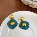 Elegant vintage style teal resin rhombus stud earrings with gold-plated metal center accents - Rhombus Texture (HE33584) / Blue