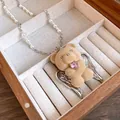 Close-up of cute flocked bear pendant with pink heart zircon and pearl necklace chain - Necklace / Silver-Coffee