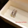 Elegant silver double-layer zircon ear clip featuring heart patterns, clip-on style - Double Layer Heart Ear Cuff (HE31846) / Silver