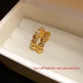 Elegant golden double-layered heart ear cuff with zircons, perfect for non-pierced ears - Double Layer Heart Ear Cuff (HE31846) / Gold