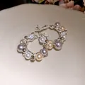 Detailed view of silver hoop earrings featuring multi-colored pearls and crystal accents - Silver Pin - Coffee - Gray
