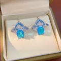 Detailed view of elegant blue and white zircon earrings in a jewelry box with fan-shaped design. - 23# Silver Needle - Silver - Blue