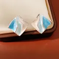 Detailed view of elegant blue and white enamel wavy pattern rhombus stud earrings - 28# Silver Needle - Silver - Blue