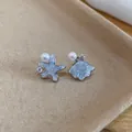 Detail view of light blue crushed ice starfish and shell earrings with pearls - 24# Silver Pin - Silver Blue