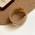 Minimalist marbled resin wide bangle bracelet in translucent amber beige finish SKU view - Marbled Round Style (45#) / Light Coffee