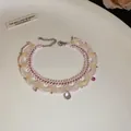 Handmade pink beaded lace necklace with glass droplets for an elegant, vintage look. - Silver-Pink-White