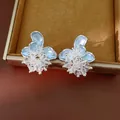 Elegant light blue flower shaped stud earrings featuring sparkling zircon crystals. - 32# Silver Needle - Silver Blue