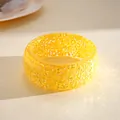 Detailed macro view of yellow resin bangle showing faceted dopamine style texture - Yellow