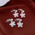 Elegant flower clip-on earrings with rhinestones and pearls on a velvet background - Clip-On Earrings / Pink and Light Green