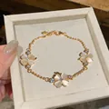 Exquisite gold-plated bracelet featuring cat's eye stone flower charms and zircon crystals - Three Flower Lobster Clasp Style (HB5438-HB5448) / Gold